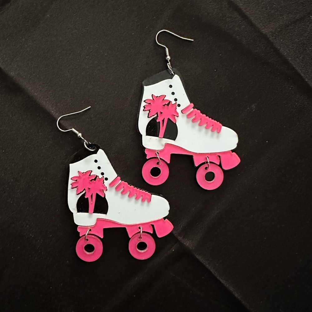 Dangle roller blade earrings